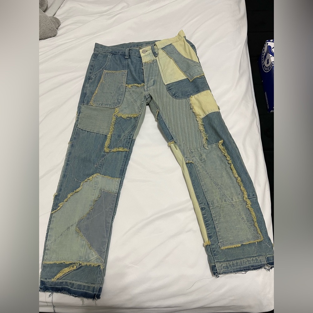 MNML Straight Distressed Reworked Jeans Size 28
Used lightly